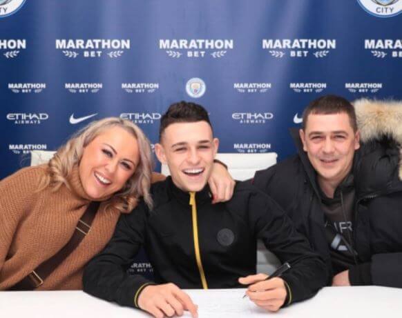 Claire Foden with her son Phil Foden and husband Phil Foden SNR.
